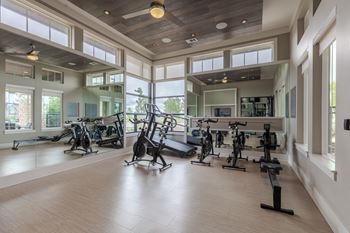 Fitness center with yoga studio, virtual trainer & towel service